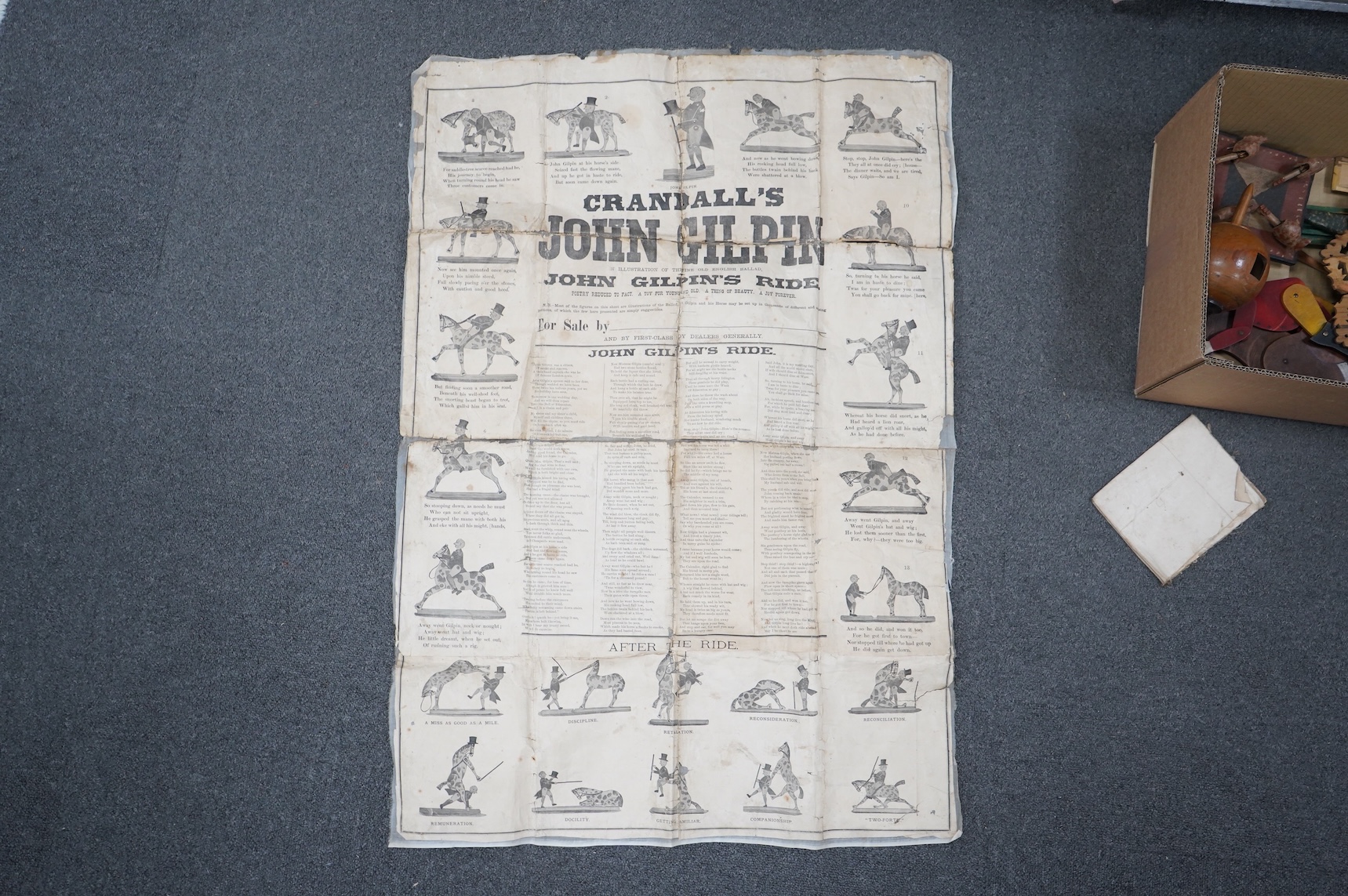 A collection of 19th century toys including; an early Jaques Ping Pong or Gossima set in an illustrated wooden case, a Crandall’s John Gilpin wooden horse with folded linen backed poster, ‘The Adventures of John Gilpin’